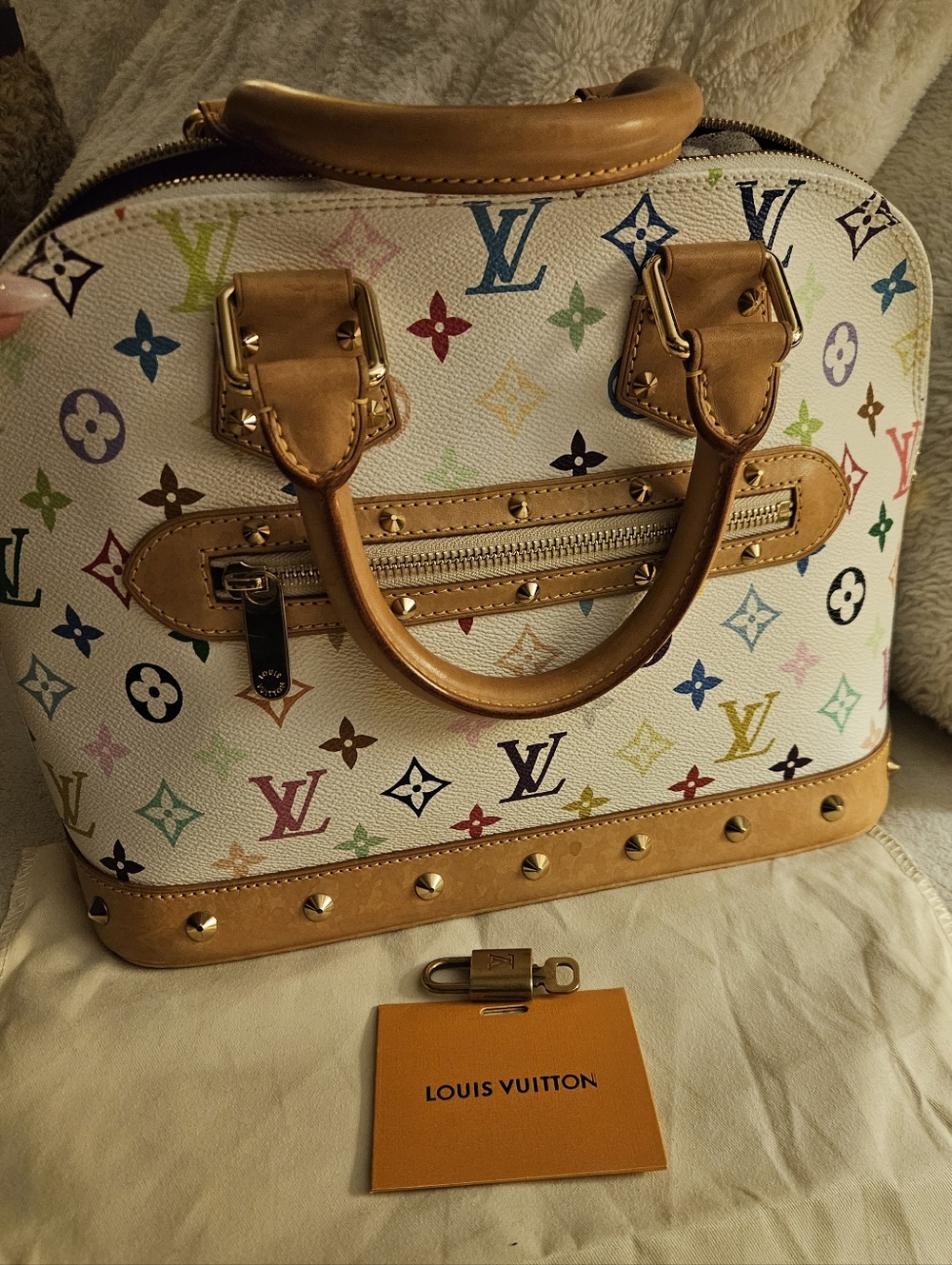Louis Vuitton Alma PM Handbag in White Multicolor Monogram With Lock & Key